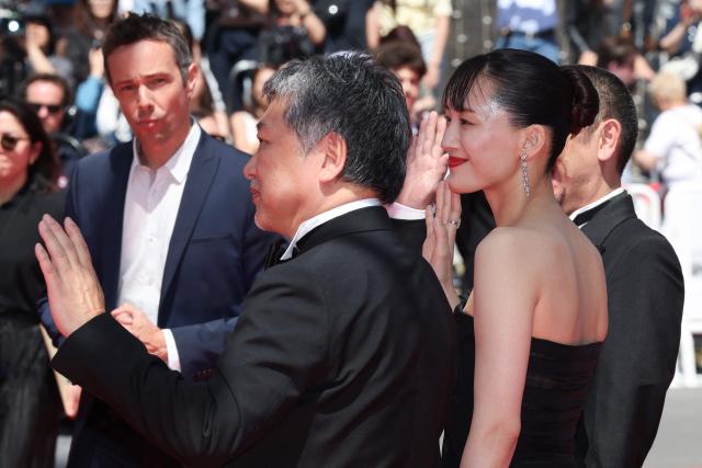 (From L) Japanese actress Haruka Ayase and Japanese actor Hirokazu Koreeda arrive for the screening of the film "Sheep in The Box" at the 79th edition of the Cannes Film Festival in Cannes, southern France on May 16, 2026. (Photo by Thibaud MORITZ / AFP)