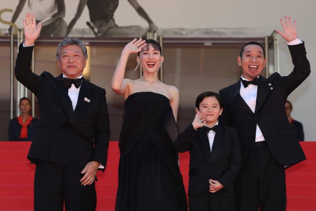(From L) Japanese actor Hirokazu Koreeda, Japanese actress Haruka Ayase, Japanese actor Rimu Kuwaki and Japanese actor and comedian Daigo Yamamoto arrive for the screening of the film "Sheep in The Box" at the 79th edition of the Cannes Film Festival in Cannes, southern France on May 16, 2026. (Photo by Thibaud MORITZ / AFP)