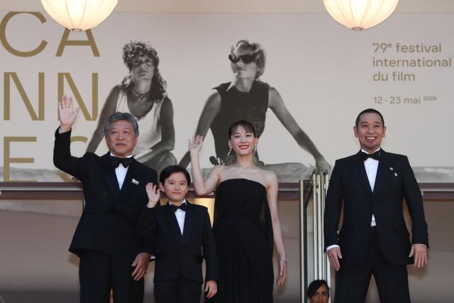 (From L) Japanese actor Hirokazu Koreeda, Japanese actress Haruka Ayase, Japanese actor Rimu Kuwaki and Japanese actor and comedian Daigo Yamamoto arrive for the screening of the film "Sheep in The Box" at the 79th edition of the Cannes Film Festival in Cannes, southern France on May 16, 2026. (Photo by Thibaud MORITZ / AFP)
