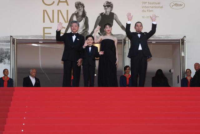 (From L) Japanese actor Hirokazu Koreeda, Japanese actress Haruka Ayase, Japanese actor Rimu Kuwaki and Japanese actor and comedian Daigo Yamamoto arrive for the screening of the film "Sheep in The Box" at the 79th edition of the Cannes Film Festival in Cannes, southern France on May 16, 2026. (Photo by Thibaud MORITZ / AFP)