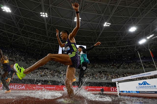 Athletes compete in the women's 3000m steeplechase event during the Shanghai/Keqiao Diamond League athletics meeting in Keqiao, Shaoxing in China's eastern Zhejiang province on May 16, 2026. (Photo by WANG Zhao / AFP)