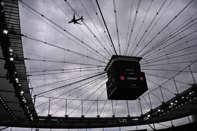 An overview shows an airplane flying over the stadion prior to the start of the German first division Bundesliga football match between Eintracht Frankfurt and VfB Stuttgart in Frankfurt am Main, western Germany, on May 16, 2026. (Photo by Kirill KUDRYAVTSEV / AFP) / DFL REGULATIONS PROHIBIT ANY USE OF PHOTOGRAPHS AS IMAGE SEQUENCES AND/OR QUASI-VIDEO