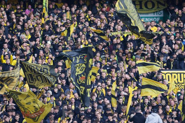 Dortmund's fans cheer their team prior the German first division Bundesliga football match between Werder Bremen and Borussia Dortmund in Bremen, northwestern Germany, on May 16, 2026. (Photo by Focke Strangmann / AFP) / DFL REGULATIONS PROHIBIT ANY USE OF PHOTOGRAPHS AS IMAGE SEQUENCES AND/OR QUASI-VIDEO