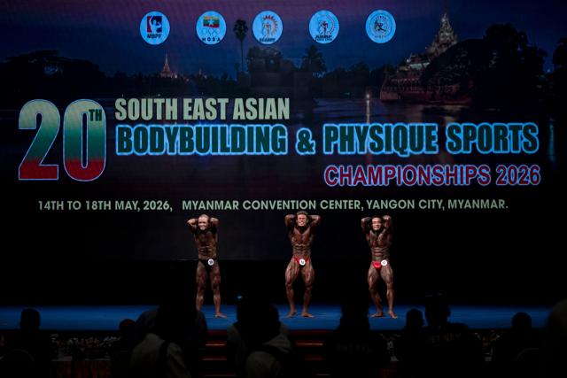 Bodybuilders compete in the 20th South East Asian Championships 2026 at the Myanmar Convention Center in Yangon on May 16, 2026. (Photo by Sai Aung MAIN / AFP)