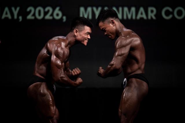Bodybuilders compete in the 20th South East Asian Championships 2026 at the Myanmar Convention Center in Yangon on May 16, 2026. (Photo by Sai Aung MAIN / AFP)