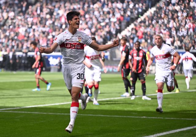 Stuttgart's Spanish midfielder #30 Chema Andres (L) celebrates after scoring the 0-1 opening goal during the German first division Bundesliga football match between Eintracht Frankfurt and VfB Stuttgart in Frankfurt am Main, western Germany, on May 16, 2026. (Photo by Kirill KUDRYAVTSEV / AFP) / DFL REGULATIONS PROHIBIT ANY USE OF PHOTOGRAPHS AS IMAGE SEQUENCES AND/OR QUASI-VIDEO