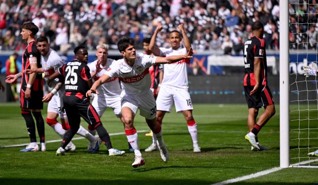 Stuttgart's Spanish midfielder #30 Chema Andres (C) celebrates after scoring the 0-1 opening goal during the German first division Bundesliga football match between Eintracht Frankfurt and VfB Stuttgart in Frankfurt am Main, western Germany, on May 16, 2026. (Photo by Kirill KUDRYAVTSEV / AFP) / DFL REGULATIONS PROHIBIT ANY USE OF PHOTOGRAPHS AS IMAGE SEQUENCES AND/OR QUASI-VIDEO