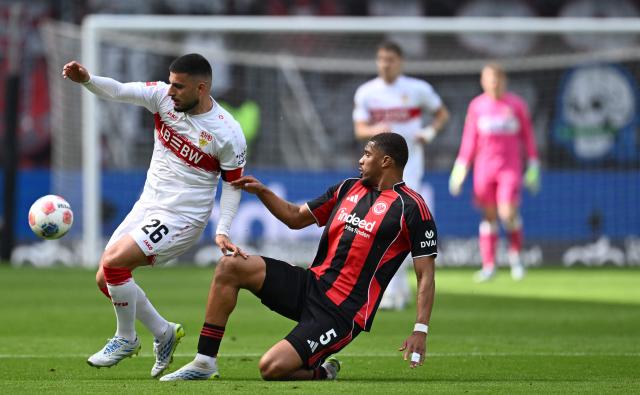 Stuttgart's German forward #26 Deniz Undav (L) and Frankfurt's Swiss defender #05 Aurele Amenda vie for the ball during the German first division Bundesliga football match between Eintracht Frankfurt and VfB Stuttgart in Frankfurt am Main, western Germany, on May 16, 2026. (Photo by Kirill KUDRYAVTSEV / AFP) / DFL REGULATIONS PROHIBIT ANY USE OF PHOTOGRAPHS AS IMAGE SEQUENCES AND/OR QUASI-VIDEO