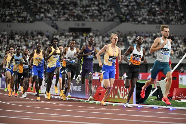 Athletes compete in the men's 3000m event during the Shanghai/Keqiao Diamond League athletics meeting in Keqiao, Shaoxing in China's eastern Zhejiang province on May 16, 2026. (Photo by Hector RETAMAL / AFP)
