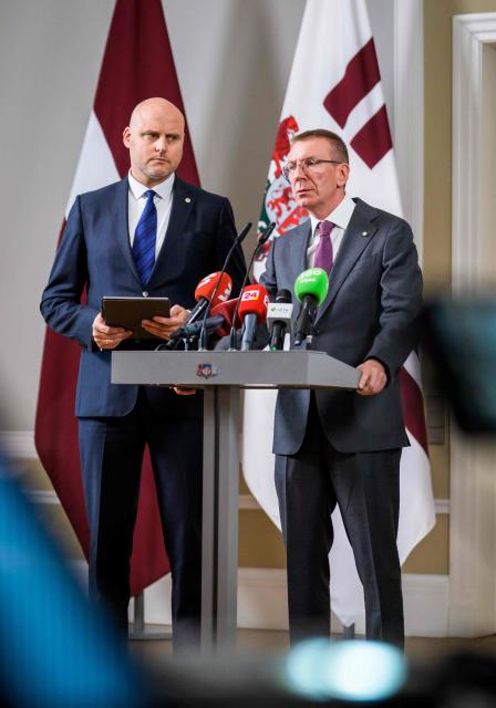 Latvia's President Edgars Rinkevics (R) announces that he asked Andris Kulbergs (L) to form a new cabinet of ministers after he met with all factions of the Saeima, Latvia's parliament, on May 16, 2026 in Riga, Latvia. Latvia's Prime Minister Evika Silina had resigned on May 14, 2026 over her government's handling of Ukrainian drones that strayed into Latvian territory during attacks in Russia. (Photo by Gints Ivuskans and AFP / AFP)