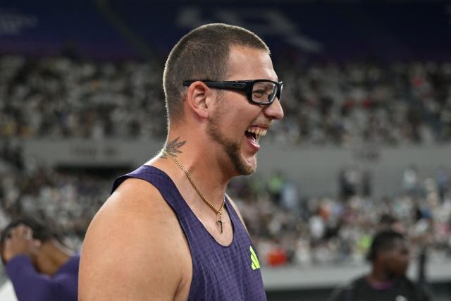 Slovenia's Kristjan Ceh celebrates winning the men's discus throw event during the Shanghai/Keqiao Diamond League athletics meeting in Keqiao, Shaoxing in China's eastern Zhejiang province on May 16, 2026. (Photo by WANG Zhao / AFP)