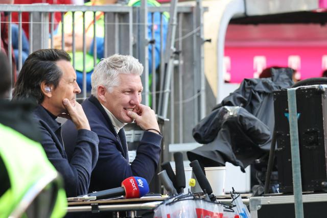 Former German football player Bastian Schweinsteiger (R) is seen during the German first division Bundesliga football match between FC Bayern Munich and FC Cologne in Munich, southern Germany, on May 16, 2026. (Photo by Alexandra BEIER / AFP) / DFL REGULATIONS PROHIBIT ANY USE OF PHOTOGRAPHS AS IMAGE SEQUENCES AND/OR QUASI-VIDEO