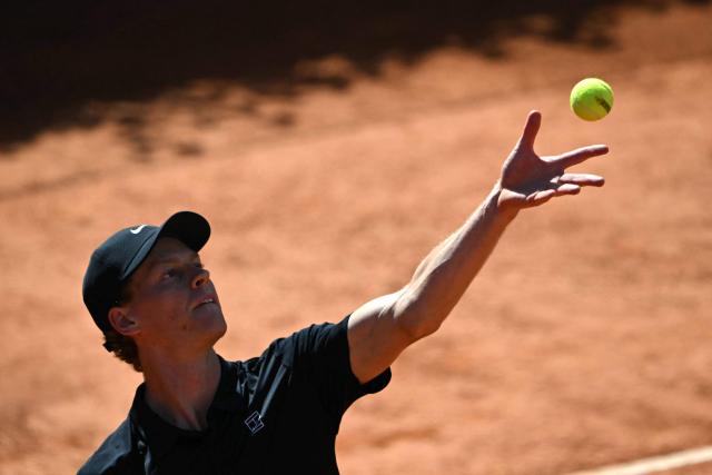 Italy's Jannik Sinner serves to Russia's Daniil Medvedev during their semi-final, which was delayed yesterday due to rainfall, at the ATP Rome Open tennis tournament at Foro Italico in Rome on May 16, 2026. (Photo by Andreas SOLARO / AFP)