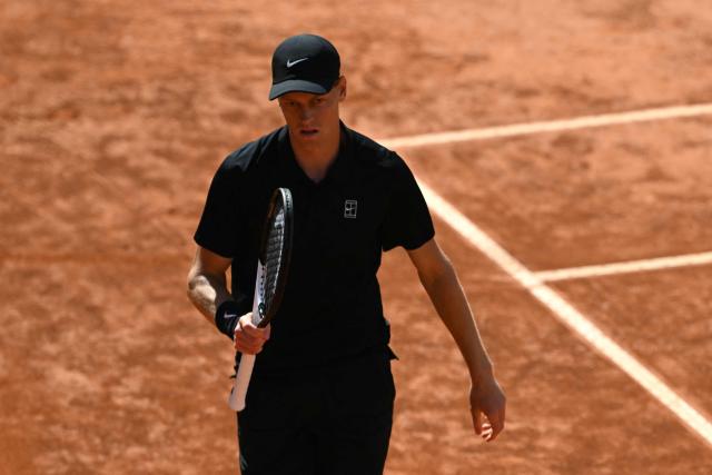 Italy's Jannik Sinner prepares to serve to Russia's Daniil Medvedev during their semi-final, which was delayed yesterday due to rainfall, at the ATP Rome Open tennis tournament at Foro Italico in Rome on May 16, 2026. (Photo by Andreas SOLARO / AFP)
