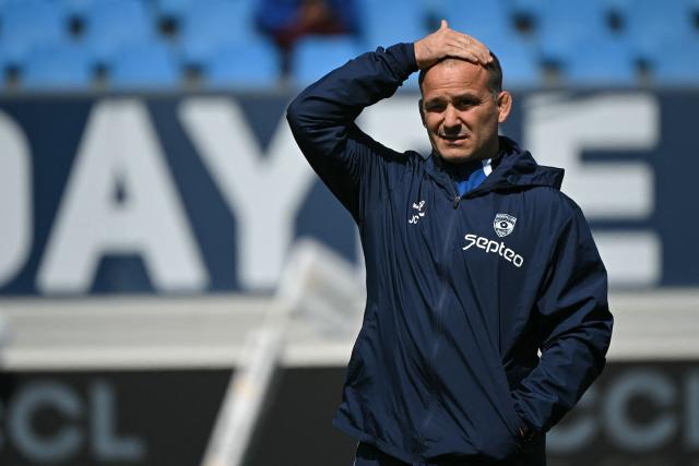 Montpellier's French head coach Joan Caudullo looks on ahead of the French Top 14 rugby union match between Castres Olympique and Montpellier Herault Rugby at Stade Pierre Fabre in Castres, southern France on May 16, 2026. (Photo by Matthieu RONDEL / AFP)