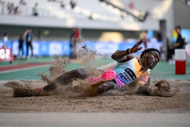 Jamaica's Wayne Pinnock competes in the men's long jump event during the Shanghai/Keqiao Diamond League athletics meeting in Keqiao, Shaoxing in China's eastern Zhejiang province on May 16, 2026. (Photo by WANG Zhao / AFP)