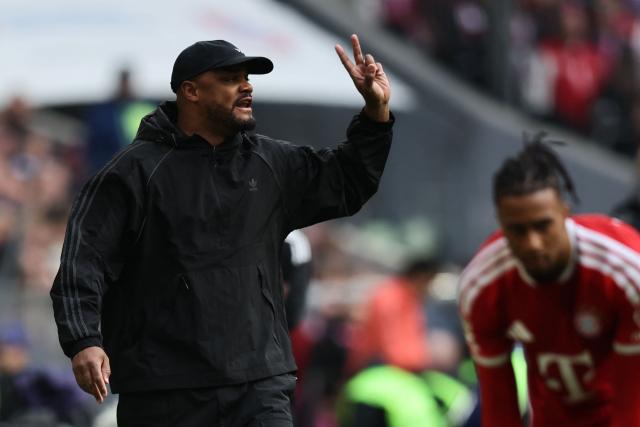Bayern Munich's Belgian head coach Vincent Kompany (L) gestures during the German first division Bundesliga football match between FC Bayern Munich and FC Cologne in Munich, southern Germany, on May 16, 2026. (Photo by Alexandra BEIER / AFP) / DFL REGULATIONS PROHIBIT ANY USE OF PHOTOGRAPHS AS IMAGE SEQUENCES AND/OR QUASI-VIDEO