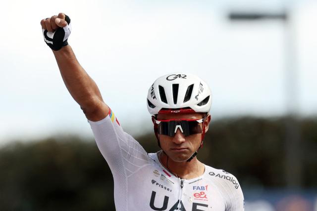 UAE Team Emirates - XRG Ecuadorian rider Jhonatan Narvaez celebrates as he crosses the finish line to win the 8th stage of the Giro d'Italia 2026 - Tour of Italy cycling race between Chieti and Fermo, central Italy on May 16, 2026. (Photo by Luca Bettini / AFP)