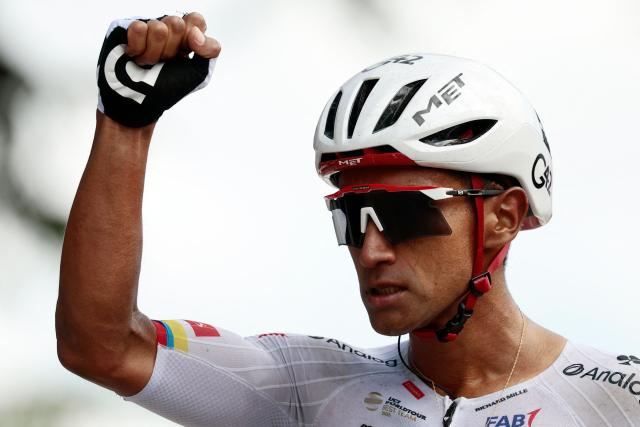UAE Team Emirates - XRG Ecuadorian rider Jhonatan Narvaez celebrates as he crosses the finish line to win the 8th stage of the Giro d'Italia 2026 - Tour of Italy cycling race between Chieti and Fermo, central Italy on May 16, 2026. (Photo by Luca Bettini / AFP)