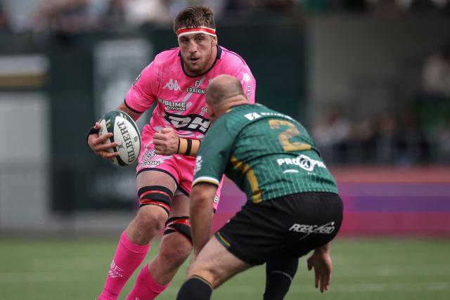 Stade Français' French lock Baptiste Pesenti (L) is tackled by Montauban's French hooker Kévin Firmin (R) during the French Top 14 rugby union match between US Montauban and Stade Français at Stade Sapiac in Montauban, south-western France, on May 16, 2026. (Photo by Valentine CHAPUIS / AFP)