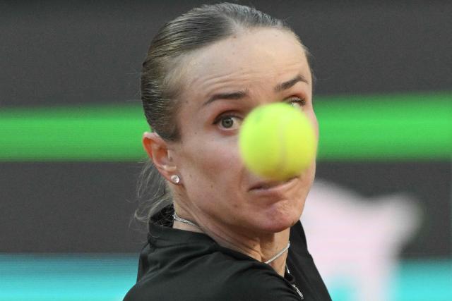 Ukraine's Elina Svitolina prepares a return to USA's Coco Gauff during the WTA Rome Open tennis tournament final at Foro Italico in Rome on May 16, 2026. (Photo by Tiziana FABI / AFP)
