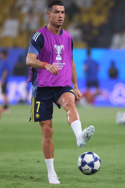 Nassr's Portuguese forward #07 Cristiano Ronaldo warms up before the start of the 2026 AFC Champions League Two final football match between Al-Nassr and Gamba Osaka at the Al-Awwal Park Stadium in Riyadh on May 16, 2026. (Photo by Fayez NURELDINE / AFP)