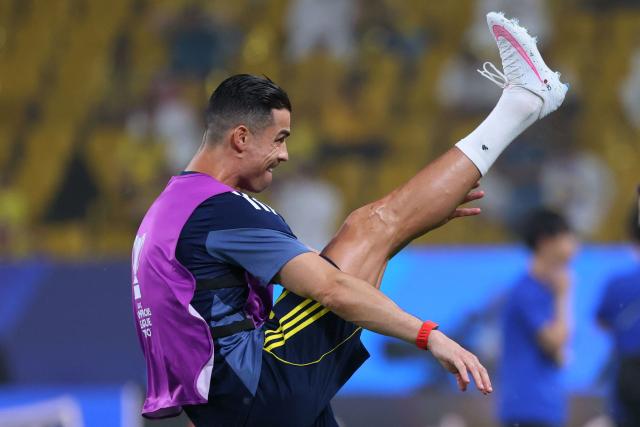Nassr's Portuguese forward #07 Cristiano Ronaldo warms up before the start of the 2026 AFC Champions League Two final football match between Al-Nassr and Gamba Osaka at the Al-Awwal Park Stadium in Riyadh on May 16, 2026. (Photo by Fayez NURELDINE / AFP)