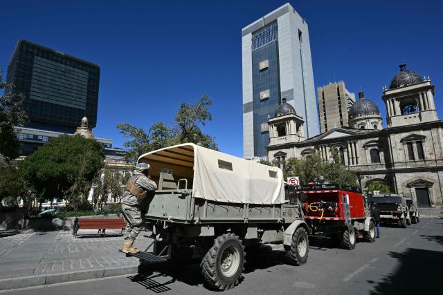 Armoured riot-control vehicles guard Murillo Square in La Paz on May 16, 2026. Bolivia's government reached an agreement on May 15 with thousands of miners who clashed with police in a protest that paralysed downtown La Paz. However, other sectors continue to block access routes to the city, home to the executive branch and Congress. (Photo by AIZAR RALDES / AFP)