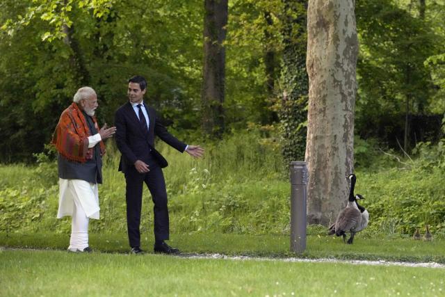 Indian Prime Minister Narendra Modi (L) and Dutch Prime Minister Rob Jetten (R) speak in the garden of the Catshuis during an official visit by India's Prime Minister to The Hague on May 16, 2026. (Photo by Lina Selg / AFP)
