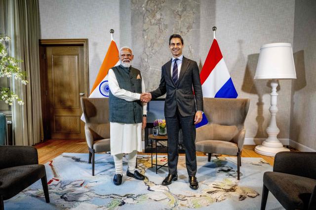 Indian Prime Minister Narendra Modi (L) and Dutch Prime Minister Rob pose ahead of their meeting at the Catshuis as part of an official visit by India's Prime Minister to The Hague on May 16, 2026. (Photo by Robin Utrecht / ANP / AFP) / Netherlands OUT