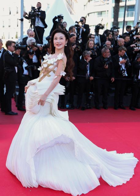 Chinese singer Chang Sisi arrives for the screening of the film "El ser querido" (The Beloved) at the 79th edition of the Cannes Film Festival in Cannes, southern France on May 16, 2026. (Photo by Sameer AL-DOUMY / AFP)