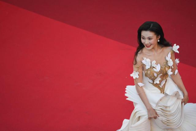 TOPSHOT - Chinese singer Chang Sisi arrives for the screening of the film "El ser querido" (The Beloved) at the 79th edition of the Cannes Film Festival in Cannes, southern France on May 16, 2026. (Photo by Olivier CHASSIGNOLE / AFP)
