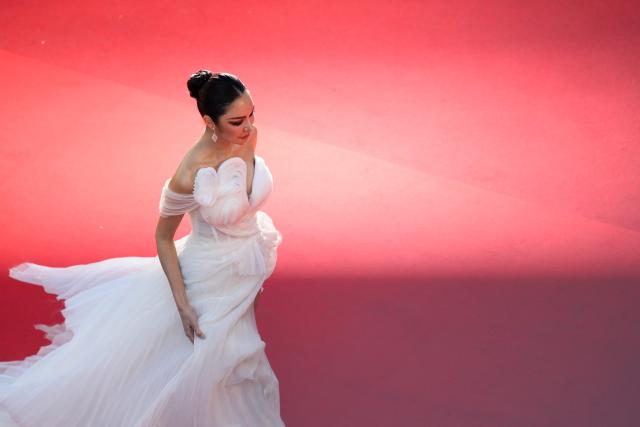 Influencer Yok Jittraphan arrives for the screening of the film "El ser querido" (The Beloved) at the 79th edition of the Cannes Film Festival in Cannes, southern France on May 16, 2026. (Photo by Olivier CHASSIGNOLE / AFP)