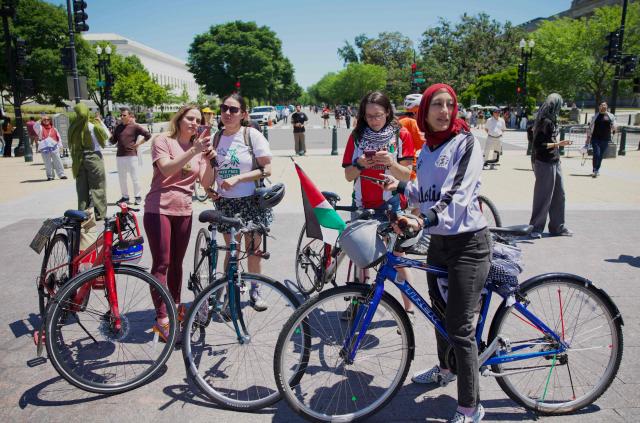 Demonstrators gather near the US Capitol while participating in a Nakba solidarity bike ride from Dupont Circle to the US Capitol in Washington, DC, on May 16, 2026, marking the 78th anniversary of the Nakba. (Photo by Amid FARAHI / AFP)