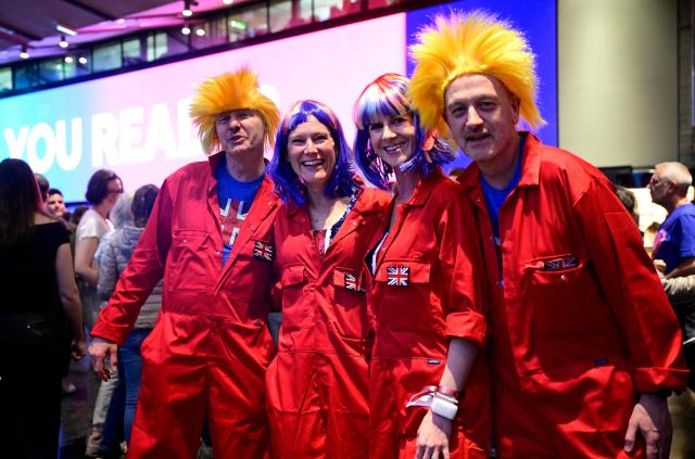 Fans of United Kingdom pose ahead the final of the Eurovision Song Contest 2026 (ESC) at Wiener Stadthalle in Vienna, Austria on May 16, 2026. (Photo by Tobias SCHWARZ / AFP)