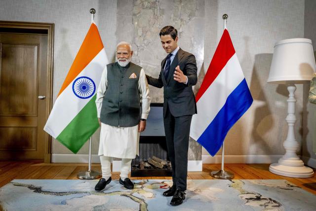 Indian Prime Minister Narendra Modi (L) and Dutch Prime Minister Rob Jetten pose ahead of their meeting at the Catshuis as part of an official visit by India's Prime Minister to The Hague on May 16, 2026. (Photo by Robin Utrecht / ANP / AFP) / Netherlands OUT