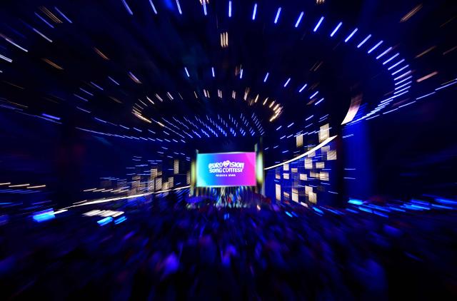 Spectators wait ahead the final of the Eurovision Song Contest 2026 (ESC) at Wiener Stadthalle in Vienna, Austria on May 16, 2026. (Photo by Tobias SCHWARZ / AFP)