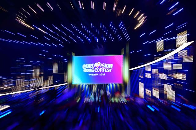 Spectators wait ahead the final of the Eurovision Song Contest 2026 (ESC) at Wiener Stadthalle in Vienna, Austria on May 16, 2026. (Photo by Tobias SCHWARZ / AFP)