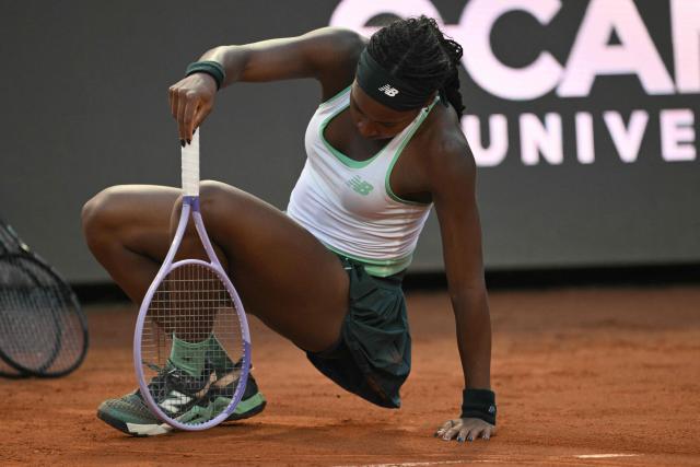 USA's Coco Gauff falls during her final against Ukraine's Elina Svitolina at Rome Open tennis tournament final at Foro Italico in Rome on May 16, 2026. (Photo by Tiziana FABI / AFP)