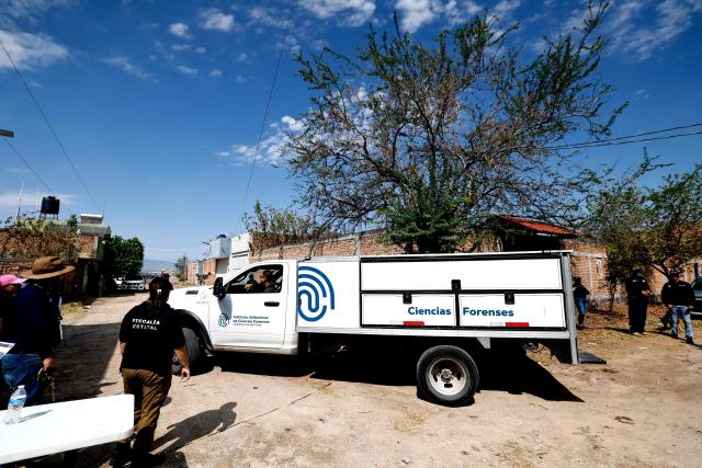 A truck from the Jalisco Institute of Forensic Sciences enters the site of the Las Pintitas mass grave during forensic work in El Salto, Jalisco state, Mexico, on May 16, 2026. (Photo by ULISES RUIZ / AFP)