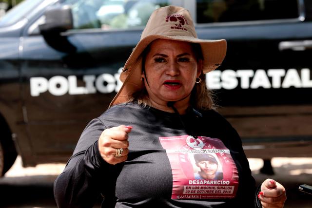 Cecilia Flores, activist and founding member of the Madres Buscadoras de Sonora collective, speaks before entering the site of the Las Pintitas mass grave in El Salto, Jalisco state, Mexico, on May 16, 2026. (Photo by ULISES RUIZ / AFP)