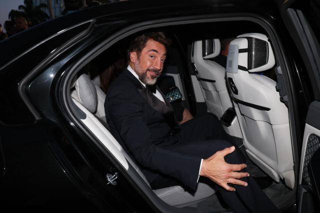 TOPSHOT - Spanish actor Javier Bardem leaves in a car after the screening of the film "El ser querido" (The Beloved) at the 79th edition of the Cannes Film Festival in Cannes, southern France on May 16, 2026. (Photo by Valery HACHE / AFP)