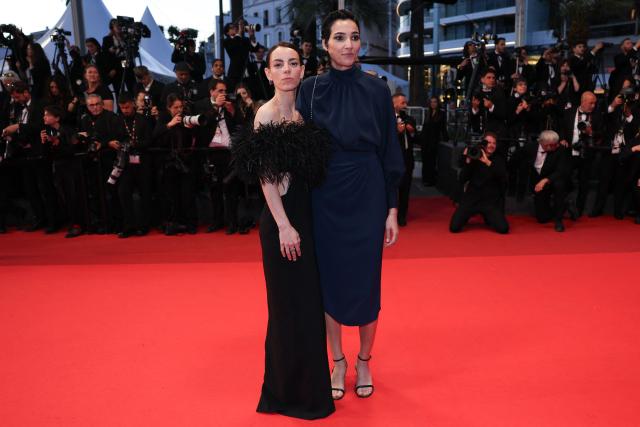 Spanish actress Victoria Luengo and Spanish screenwriter Isabel Pena leave after the screening of the film "El ser querido" (The Beloved) at the 79th edition of the Cannes Film Festival in Cannes, southern France on May 16, 2026. (Photo by Thibaud MORITZ / AFP)