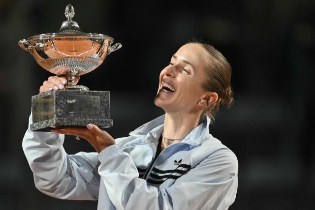 Ukraine's Elina Svitolina poses with the trophy after winning the WTA Rome Open tennis tournament final against USA's Coco Gauff at Foro Italico in Rome on May 16, 2026. (Photo by Tiziana FABI / AFP)