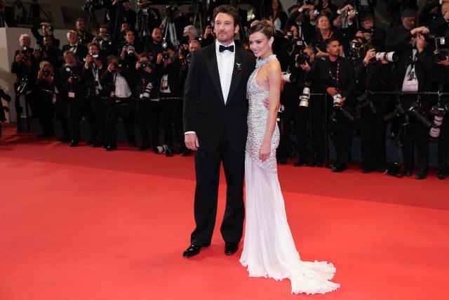 US actor Miles Teller and his wife US actress Keleigh Sperry arrive for the screening of the film "Paper Tiger" at the 79th edition of the Cannes Film Festival in Cannes, southern France on May 16, 2026. (Photo by Thibaud MORITZ / AFP)