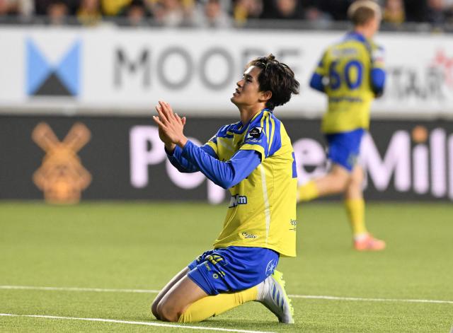 STVV's Japanese forward #42 Keisuke Goto reacts during the Belgian Pro League Champions' play-off (day 8 out of 10) football match between Sint-Truiden VV and KAA Gent in Sint-Truiden on May 16, 2026. (Photo by JOHN THYS / Belga / AFP) / Belgium OUT