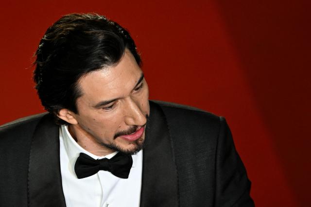 US actor Adam Driver arrives for the screening of the film "Paper Tiger" at the 79th edition of the Cannes Film Festival in Cannes, southern France on May 16, 2026. (Photo by Antonin THUILLIER / AFP)