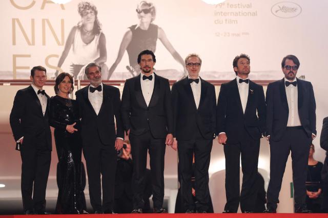 (From L) US editor Scott Morris, US producer Raffaella Leone, US film producer Anthony Katagas, US actor Adam Driver, US director James Gray, US actor Miles Teller and Brazilian producer Rodrigo Teixeira arrive for the screening of the film "Paper Tiger" at the 79th edition of the Cannes Film Festival in Cannes, southern France on May 16, 2026. (Photo by Thibaud MORITZ / AFP)
