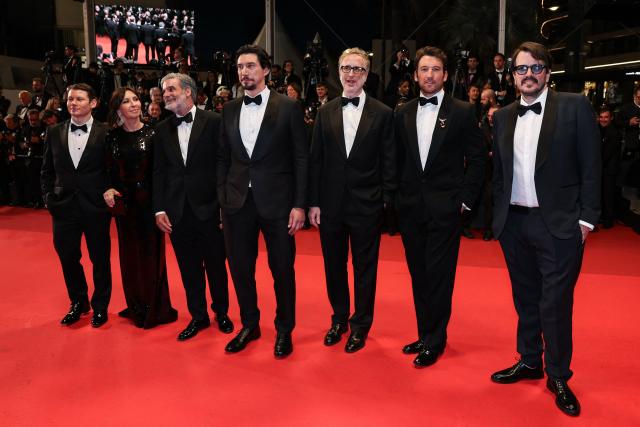 (From L) US editor Scott Morris, US producer Raffaella Leone, US film producer Anthony Katagas, US actor Adam Driver, US director James Gray, US actor Miles Teller and Brazilian producer Rodrigo Teixeira arrive for the screening of the film "Paper Tiger" at the 79th edition of the Cannes Film Festival in Cannes, southern France on May 16, 2026. (Photo by Thibaud MORITZ / AFP)