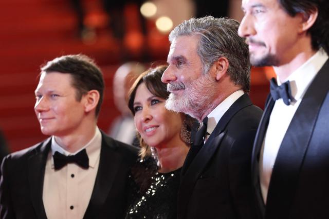 (From L) US editor Scott Morris, US producer Raffaella Leone, US film producer Anthony Kataga and US actor Adam Driver arrive for the screening of the film "Paper Tiger" at the 79th edition of the Cannes Film Festival in Cannes, southern France on May 16, 2026. (Photo by Thibaud MORITZ / AFP)
